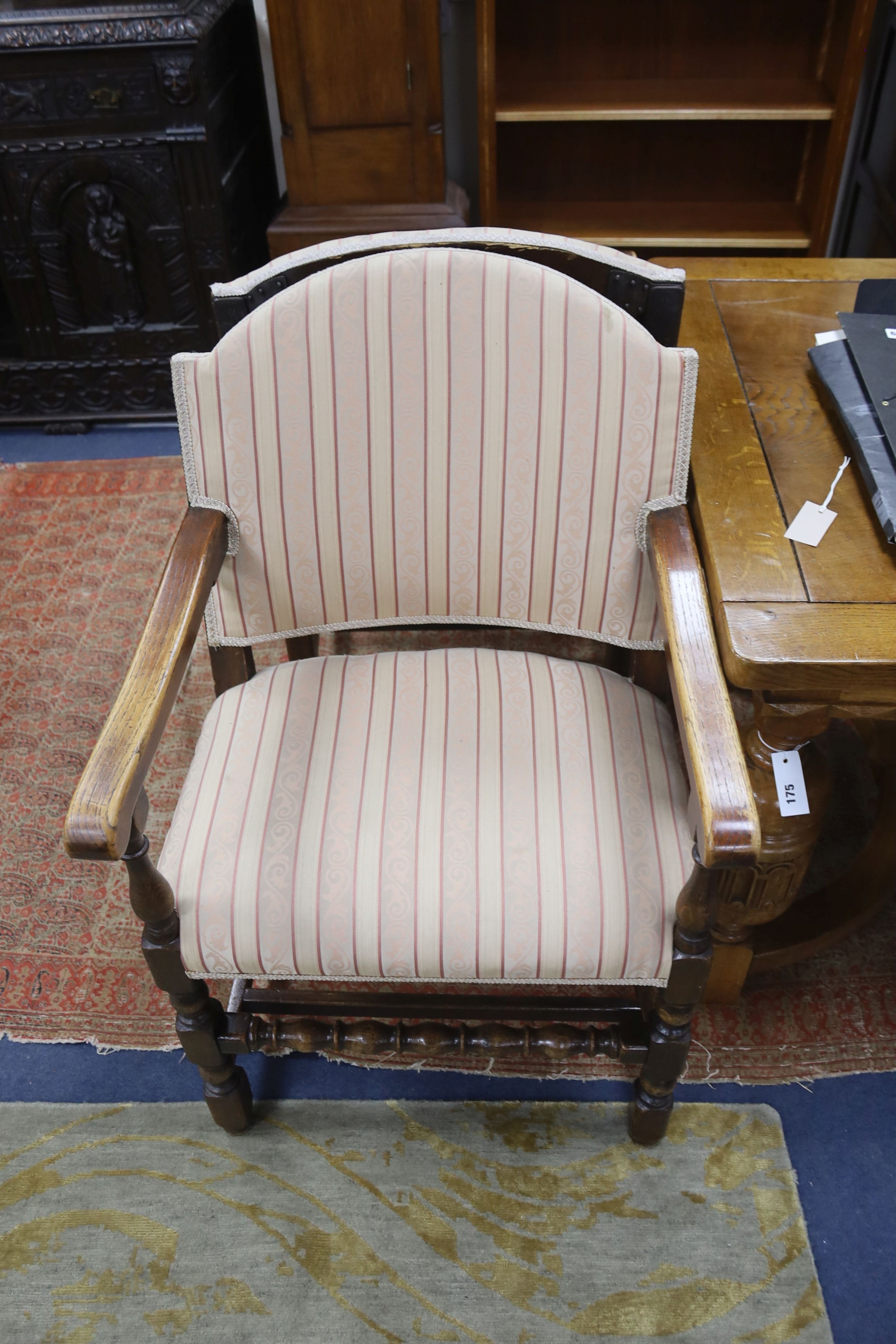 A set of eight 18th century style upholstered oak dining chairs, two with arms